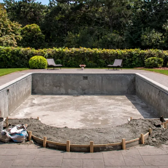 A technician performing professional pool maintenance in Los Angeles.
